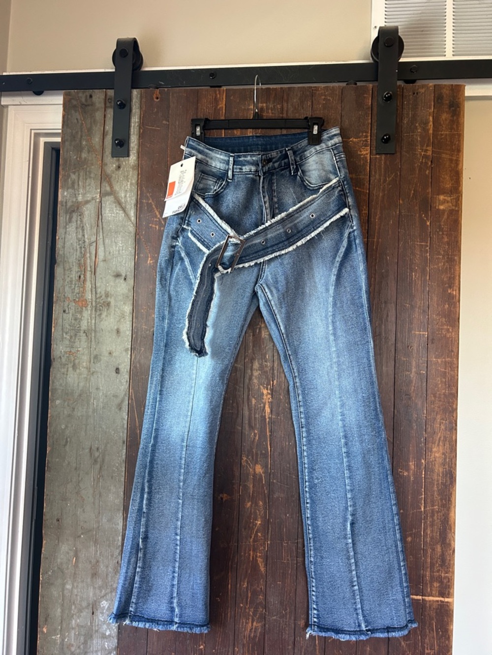 Women’s Blue Flare Jeans with Frayed Belt
